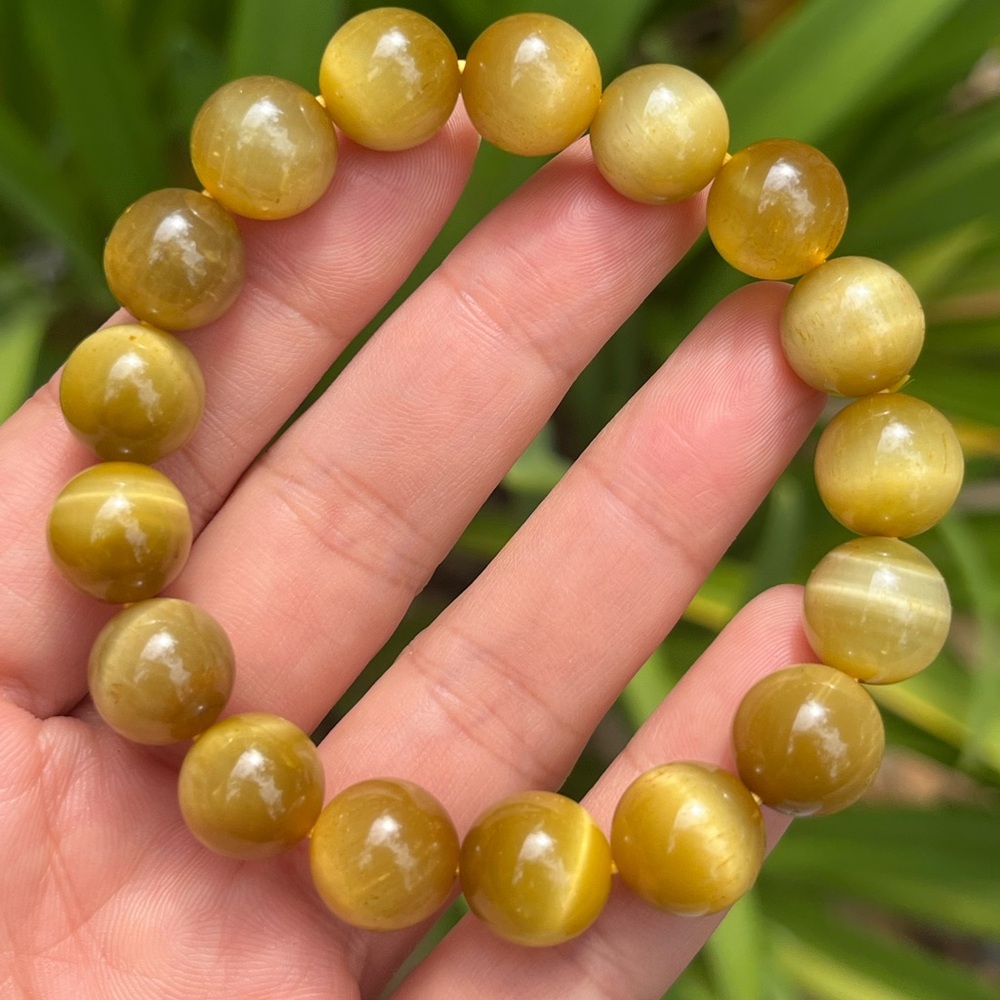 11.5mm stretchable flashy‎ ice yellow tiger eye bracelet
